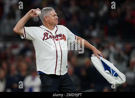 Former Atlanta Braves player Dale Murphy tips his hat to cheering fans  before a spring baseball exhibition game against the Miami Marlins, Friday,  March 15, 2019, in Kissimmee, Fla. (AP Photo/John Raoux