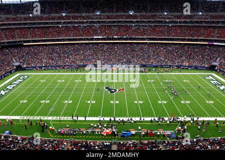 NFL action is seen in a general stadium view from an end zone in