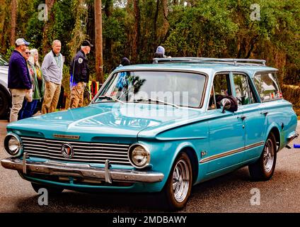 A vintage Plymouth Valiant participates in the Krewe de la Dauphine Mardi Gras parade, Jan. 21, 2023, in Dauphin Island, Alabama. Stock Photo