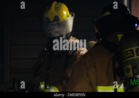 375th Civil Engineering Squadron firefighters put out a simulated ...