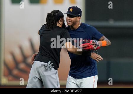 Houston Astros center fielder Jose Siri attempts to catch a fly ball by  Tampa Bay Rays' Brett Phillips during the second inning of a baseball game  Wednesday, Sept. 29, 2021, in Houston.