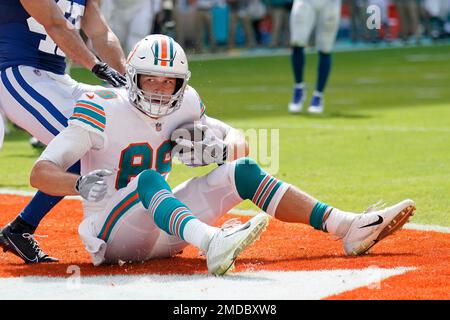 Miami Dolphins tight end Mike Gesicki (88) scores a touchdown during the  second half of an NFL football game against the Indianapolis Colts, Sunday,  Oct. 3, 2021, in Miami Gardens, Fla. (AP