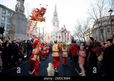 London, UK. 22nd Jan, 2023. Stunt performers perform the dragon dance at the parade in the morning prior to the main celebration at Trafalgar Square. The London Chinatown Chinese Association (LCCA) brings back the celebration for Lunar New Year to London after on hold last year due to COVID pandemic. The theme of the celebration this year is Festival of Spring and to celebrate the Year of Rabbit. Credit: SOPA Images Limited/Alamy Live News Stock Photo