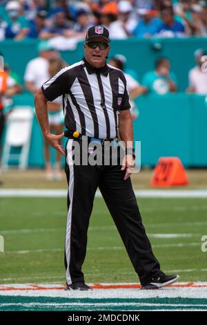 NFL side judge Jeff Lamberth (21) wears a hat with Crucial Catch  embroidered into it during an NFL football game between the Cleveland  Browns and Dallas Cowboys, Sunday, Oct. 4, 2020, in