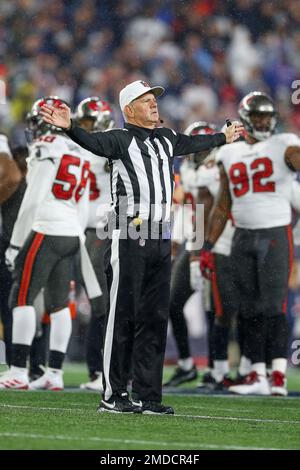 Referee Bill Vinovich (52) looks toward the Kansas City Chiefs bench during  an NFL football game against the Tampa Bay Buccaneers, Sunday, Oct. 2, 2022  in Tampa, Fla. The Chiefs defeat the