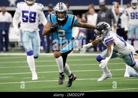 Dallas Cowboys' Osa Odighizuwa (97) and Damontae Kazee (18) celebrate with  Trevon Diggs (7) after Diggs intercepted a pass in the second half of an  NFL football game against the Carolina Panthers