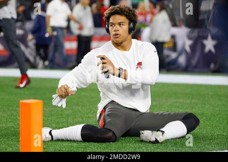 Tampa Bay Buccaneers linebacker Joe Tryon-Shoyinka (9) stretches out prior  to an NFL football game against the New England Patriots, Sunday, Oct. 3,  2021, in Foxborough, Mass. (AP Photo/Greg M. Cooper Stock