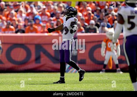 Baltimore, United States. 24th Dec, 2022. The football pops loose from  Atlanta Falcons quarterback Desmond Ridder (4) under pressure from  Baltimore Ravens linebacker Odafe Oweh (L) during the first half at M&T