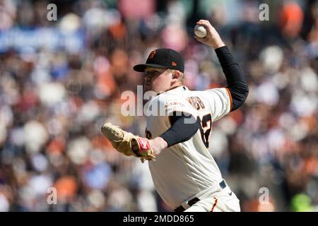 San Francisco, United States. 03rd Oct, 2021. San Francisco Giants pitcher Logan  Webb is greeted in the dugout after leaving the game against the San Diego  Padres in the eighth inning at