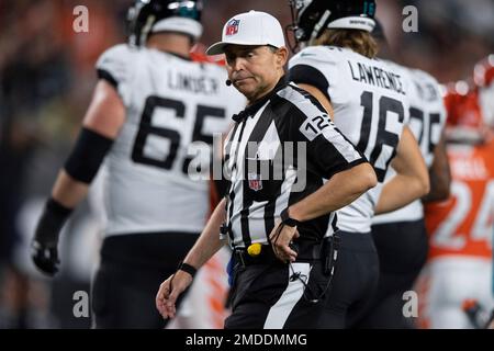 Replay official Jimmy Oldham, left, umpire Butch Hannah (40), umpire Barry  Anderson (20), head linesman Jim Mello (48), referee Brad Allen (122),  field judge Steve Zimmer (33), field judge Buddy Horton (82)