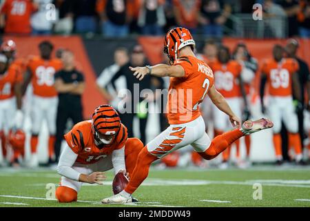 Cincinnati Bengals kicker Evan McPherson (2) kicks the game-winning field  goal out of the hold of Kevin Huber (10) during the second half of an NFL  football game against the Jacksonville Jaguars,