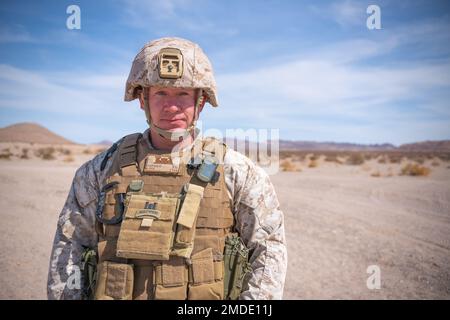 U.S. Marine Corps Gunnery Sgt. Brandon Patrick, a combat engineer assigned to Echo Company, 4th Combat Engineer Battalion, 4th Marine Division, poses for a portrait during Integrated Training Exercise 4-22, at Marine Corps Air-Ground Combat Center, Twentynine Palms, Calif., July 22, 2022.    'I've gotten out before. I got out in '07 and came back to active duty, did eight years…then continued to serve in the Reserves. I already knew from the first time that I got out that it's not so much the Marine Corps you miss; it's the Marines. There's nothing like us. Regardless of how nasty it gets, I l Stock Photo