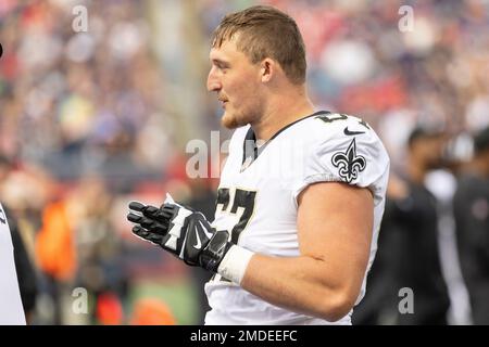 New Orleans Saints tackle Landon Young (67) on the side line