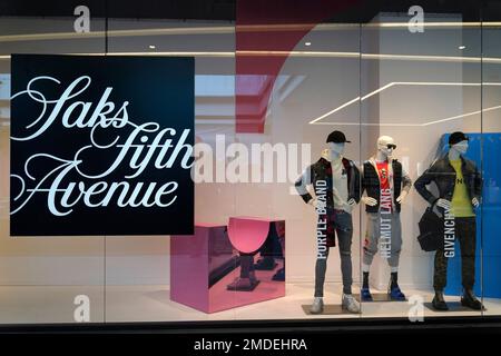 Displays are ready for customers in the Louis Vuitton section of Saks Fifth  Avenue at the American Dream mall in East Rutherford, N.J., Wednesday,  Sept. 15, 2021. (AP Photo/Seth Wenig Stock Photo 