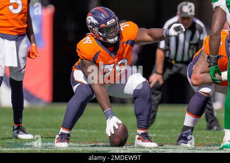 Denver, CO, USA. 28th Nov, 2021. Denver Broncos center Lloyd Cushenberry  (79) snaps the ball to Denver Broncos quarterback Teddy Bridgewater (5) in  the first half of the football game between the