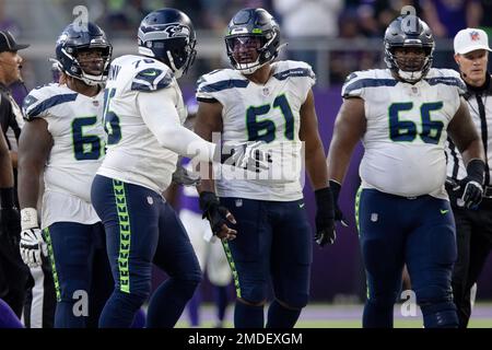 Seattle Seahawks center Kyle Fuller (61) walks off the field