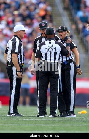 FOXBOROUGH, MA - AUGUST 11: Side judge Allan Baynes (56) confers