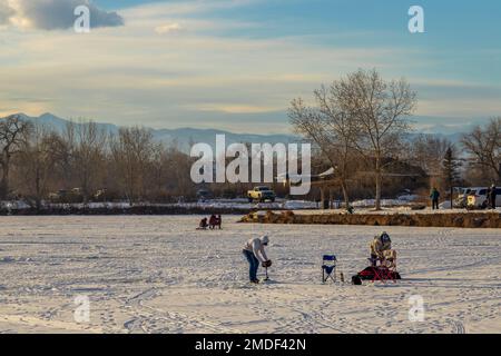 Longmont, Colorado - January 8, 2023: Ice Fishing on Blue Heron Reservoir in St. Vrain State Park, Longmont, Colorado Stock Photo