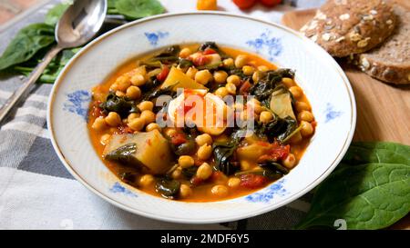 Chickpea stew with spinach and chorizo Stock Photo