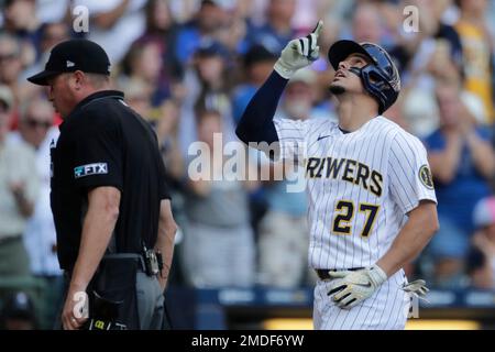 Milwaukee Brewers' Willy Adames, right, celebrates after his base hit  during the eighth inning of a baseball game against the Toronto Blue Jays,  Sunday, June 26, 2022, in Milwaukee. (AP Photo/Kenny Yoo