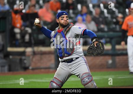 Texas Rangers catcher Jose Trevino, left, and relief pitcher Ian