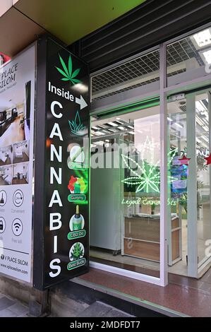 A cannabis dispensary along busy Silom Road, Bangkok, selling pre-rolled joints, edibles, oils and buds Stock Photo