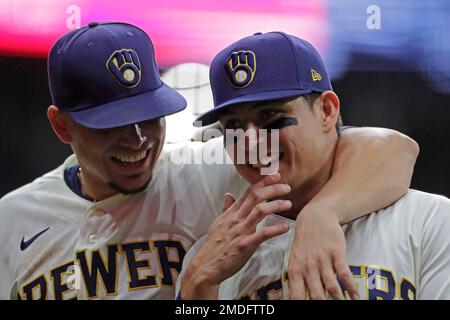 Milwaukee Brewers' Willy Adames, right, celebrates after his base hit  during the eighth inning of a baseball game against the Toronto Blue Jays,  Sunday, June 26, 2022, in Milwaukee. (AP Photo/Kenny Yoo