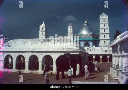 Nagore Dargah is a dargah built over the tomb of the Sufi saint Shahul Hameed. It is located in Nagore, a coastal town in the South Indian state of Tamil Nadu. There are five minarets in the dargah, with the Hindu Maratha ruler of Thanjavur Pratap Singh (1739–1763 CE), building the tallest minaret. The dargah is a major pilgrimage centre that attracts pilgrims from both Islam and Hinduism, symbolizing peaceful coexistence between the two religions. Stock Photo