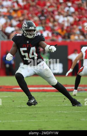 Atlanta Falcons linebacker Foye Oluokun (54) reaches ts after a Atlanta  Falcons recovery on a kickoff against the New Orleans Saints during the  second half of an NFL football game, Thursday, Nov.