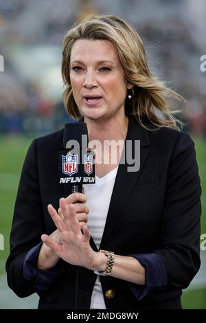 NFL Network reporter Stacey Dales works from the sideline before an NFL  football game between the New Orleans Saints and the Green Bay Packers,  Sunday, Sept. 12, 2021, in Jacksonville, Fla. (AP