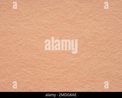 Beige or soft brown blank felt texture closeup. Full frame retro, vintage pattern. Textured wool pattern for shops with goods, creativity to Stock Photo