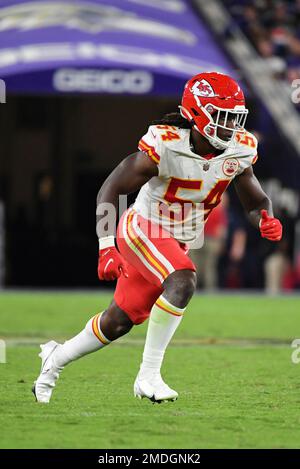 Kansas City Chiefs linebacker Nick Bolton jars the ball away