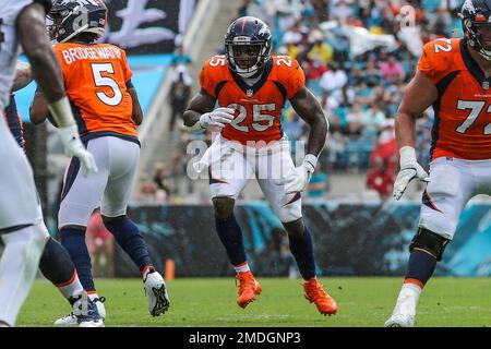 Denver Broncos running back Melvin Gordon III (25) takes part in drills  during the NFL team's practice at the Broncos' headquarters Monday, June  13, 2022, in Centennial, Colo. (AP Photo/David Zalubowski Stock