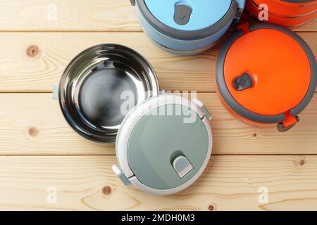 New empty plastic lunch box on a wooden background Stock Photo