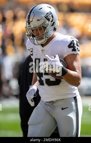 Las Vegas Raiders fullback Alec Ingold (45) leaps over New York