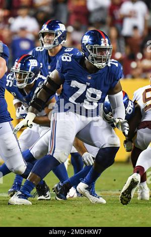 New York Giants offensive tackle Korey Cunningham (70) is seen before an  NFL football game against the Dallas Cowboys, Thursday, Nov. 24, 2022, in  Arlington, Texas. Dallas won 28-20. (AP Photo/Brandon Wade