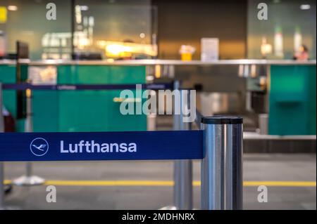 Closed Lufthansa counter in the check-in area of an airport - Leipzig, Germany, 23.10.2022 Stock Photo
