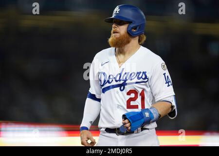 Los Angeles Dodgers' Justin Turner (21) stands at first base during the  second inning of a baseball game Wednesday, Sept. 15, 2021, in Los Angeles.  Turner wore jersey number 21 in honor of former MLB right fielder Roberto  Clemente. Turner was