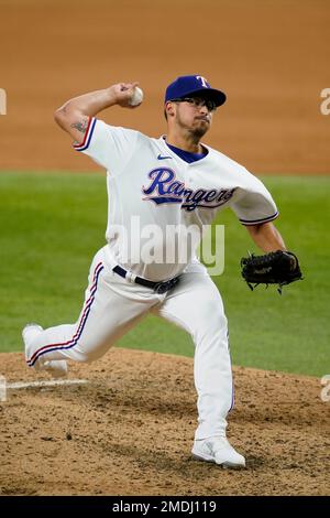 Texas Rangers relief pitcher Dane Dunning prepares to pitch during