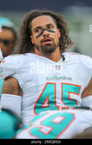 Miami Dolphins linebacker Duke Riley (45) smiles as he signs autographs for  fans in the stands before an NFL football game against the Houston Texans,  Sunday, Nov. 27, 2022, in Miami Gardens