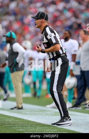 Game officials pose on the field before an NFL football game between the Minnesota  Vikings and the Chicago Bears, Sunday, Dec. 30, 2018, in Minneapolis. Shown  are replay assistant Willie Vizoso, from