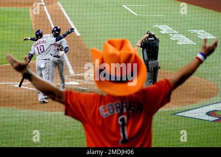 Houston Astros fan Mark McKee of Beaumont Texas celebrates as