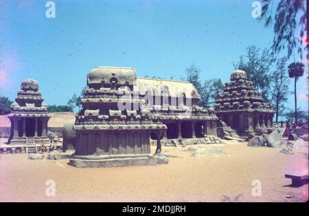 The Shore Temple is a complex of temples and shrines that overlooks the shore of the Bay of Bengal. It is located in Mahabalipuram, about 60 kilometres south of Chennai in Tamil Nadu, India. It is a structural temple, built with blocks of granite, dating from the 8th century AD. The site has 40 ancient monuments and Hindu temples, including Descent of the Ganges or Arjuna's Penance – one of the largest open-air rock relief in the world. The complex consists of three separate shrines: two dedicated to the god Shiva, and one to Vishnu. Stock Photo