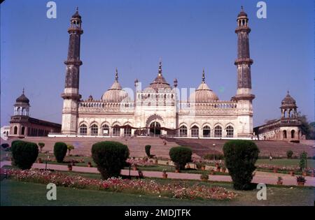 Jama Masjid, Tehseenganj, Husainabad, Lucknow is a mosque located in the area of Lucknow. The construction of this mosque was started in the year 1839 A.D. by Mohammad Ali Shah, third Badshah of Awadh. The mosque is designed in a harmonious combination of Hindu and Muslim architectural styles. It's built out of yellow sandstone and lakhauri (special small size bricks). The uniqueness of the building lies in the fact that its 15 domes stand on 260 pillars. Stock Photo