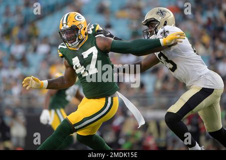 Green Bay Packers linebacker Chauncey Rivers (47) is blocked by