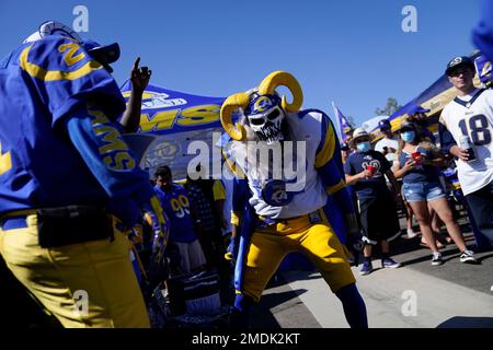 Fans for the Los Angeles Chargers and the Las Vegas Raiders tailgate in  front of SoFi stadium before an NFL football game, Monday, Oct. 4, 2021, in  Inglewood, Calif. (AP Photo/Marcio Jose