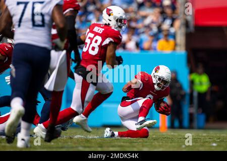 Arizona Cardinals linebacker Isaiah Simmons (9) tackles Philadelphia Eagles  quarterback Jalen Hurts (1) during the second half an NFL football game,  Sunday, Oct. 9, 2022, in Glendale, Ariz. (AP Photo/Ross D. Franklin