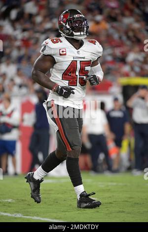 Tampa Bay Buccaneers linebacker Devin White (45) walks toward the locker  room after warmups before an NFL football game against the Kansas City  Chiefs, Sunday, Oct. 2, 2022 in Tampa, Fla. The