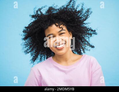 Shake hair, happy face portrait and black woman with healthy shampoo hairstyle, studio beauty or facial skincare. Cosmetic makeup, spa salon and afro Stock Photo