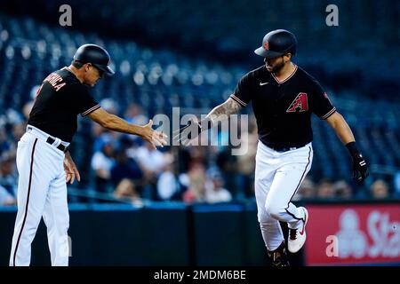 D-backs third-base coach Tony Perezchica tried waving a runner